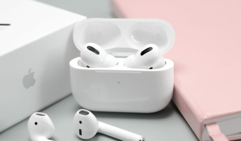 Apple AirPods Pro with white charging case.